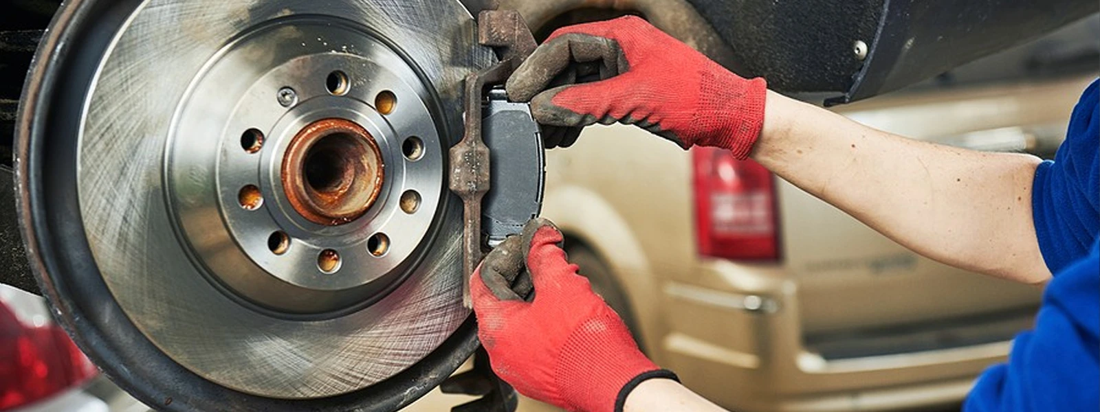 a DIYer replacing the brake pad